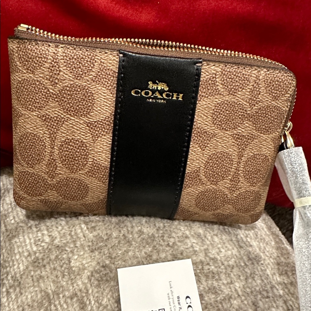 Coach Tan and Black Wristlet